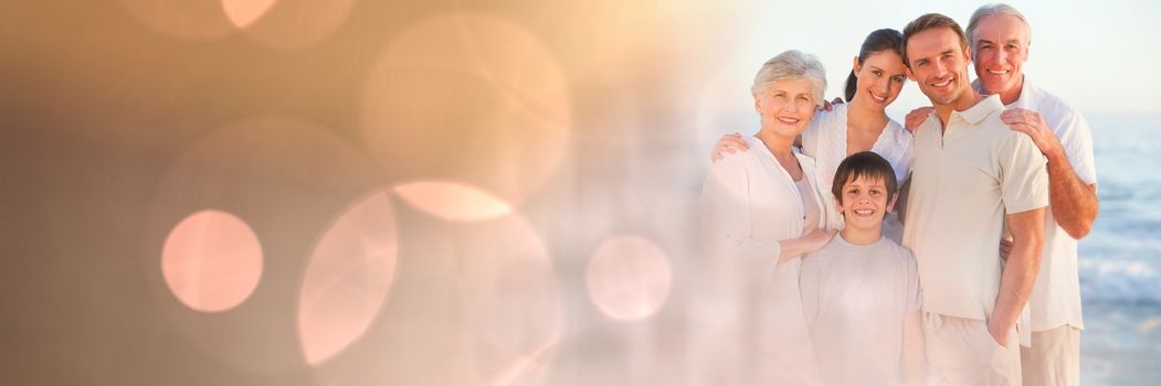 Digital composite of Family at beach with peach bokeh transition