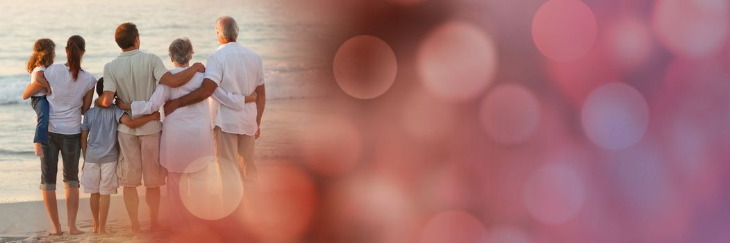 Digital composite of Back of family at beach with red bokeh transition