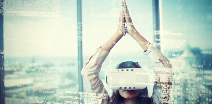 Image of data against businesswoman practicing yoga while using virtual reality 3D glasses