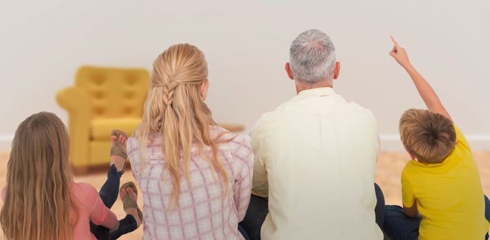 Rear view of family against yellow armchair by table on hardwood floor against wall 