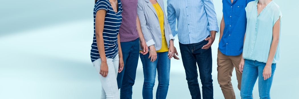 Digital composite of Group of People standing with blurred blue background