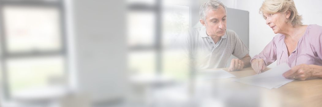 Digital composite of Older People Signing Paper Agreement with window transition