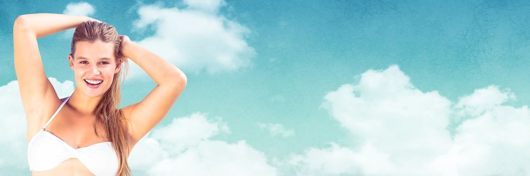 Digital composite of Millennial woman stretching in bikini against Summer sky