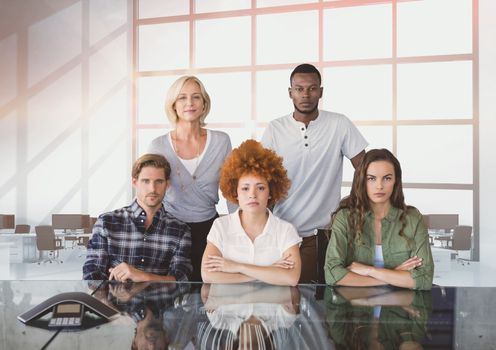 Digital composite of Business people at a desk looking  angry