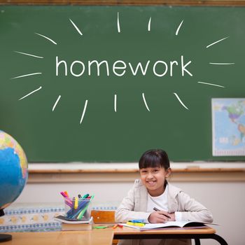 The word homework against cute pupil sitting at desk