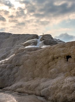 White limestone mineral forests in Pamukkale, Turkey, on a summer morning.