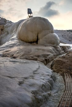 White limestone mineral forests in Pamukkale, Turkey, on a summer morning.