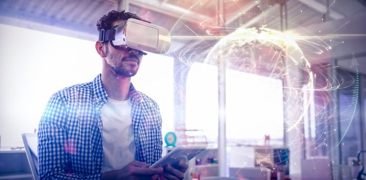 Global technology background in green against executive using virtual reality headset and digital tablet