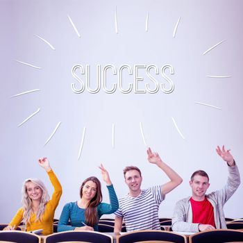 The word success against college students raising hands in the classroom