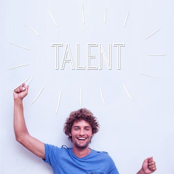 The word talent against happy student holding chalk