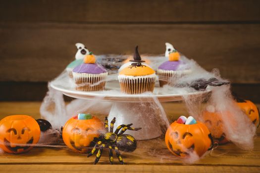Close up of sweet food on wooden table during Halloween