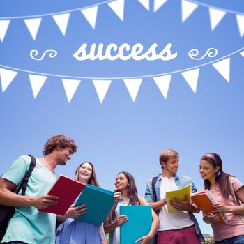 The word success and bunting against students standing and chatting together 