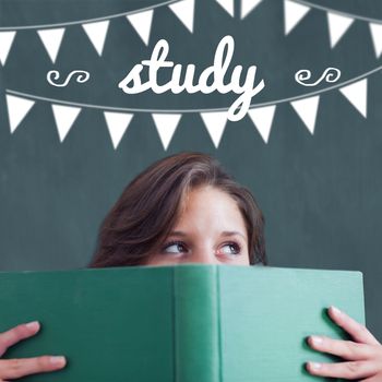 The word study and bunting against student holding book