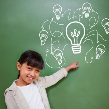 Idea and innovation graphic against cute pupil pointing