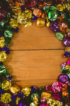 Overhead view of colorful chocolates arranged on table during Halloween