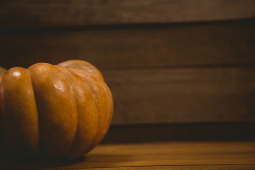 Pumpkin on wooden table during Halloween