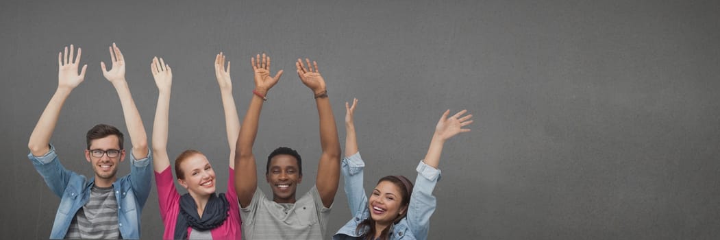 Digital composite of Happy people raising hands against wide blank grey