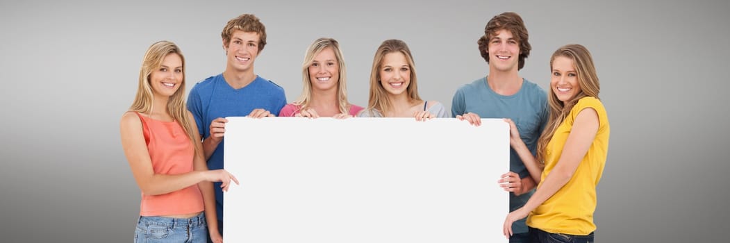 Digital composite of People holding a blank card against grey background