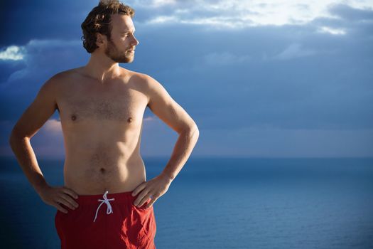 Men in summer  against scenic view of seascape against cloudy sky