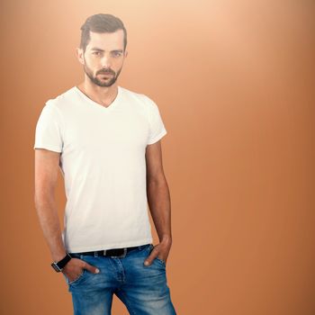 Confident and handsome man posing  against brown background