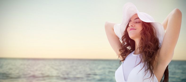 Portrait of women wearing a hat in summer  against sea against clear sky