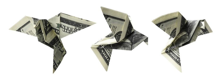 Hundred dollar bills in the shape of birds in flight on a white background.