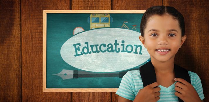 Portrait of smiling girl with bag against education against green chalkboard