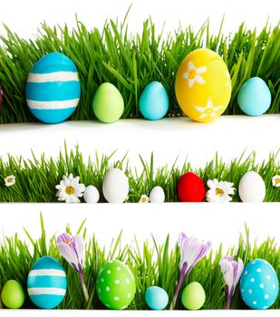 Fresh spring and Easter borders isolated on white background. Eggs, flowers and green grass.