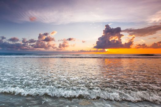 Amazing sunset form Bali Double Six beach surf waves and colorful clouds