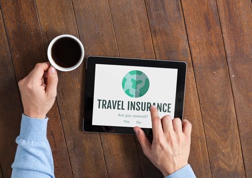 Digital composite of Man using a tablet with travel insurance concept on screen