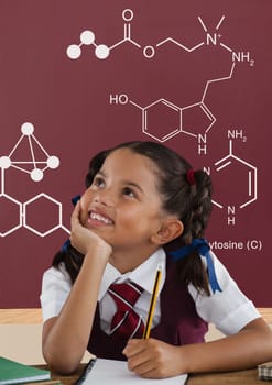 Digital composite of Student girl at table looking up against red blackboard with school and education graphic