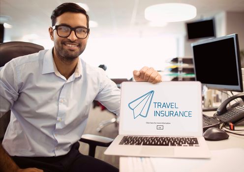 Digital composite of Man holding a computer with travel insurance concept on screen
