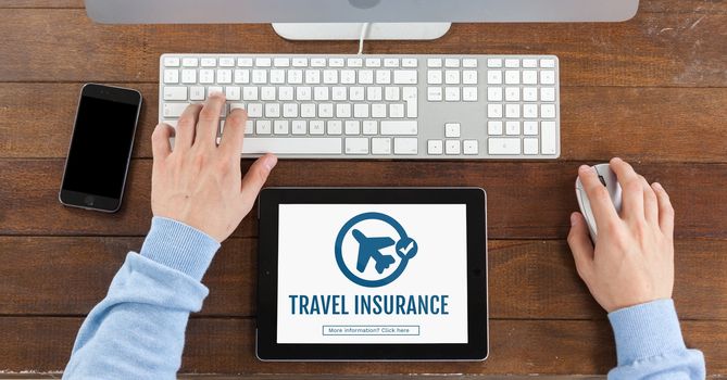 Digital composite of Tablet with travel insurance concept on screen