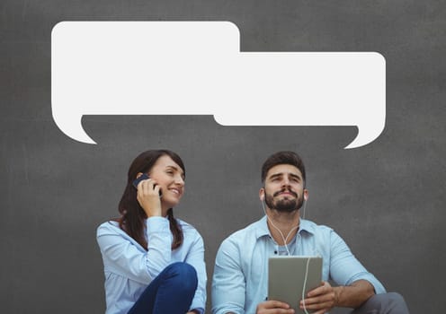 Digital composite of Business people with speech bubbles sitting against grey background