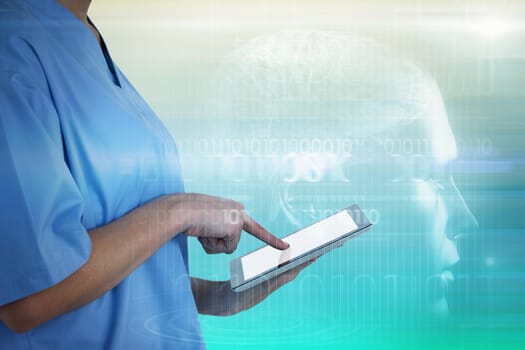 Midsection of female doctor using digital tablet against turquoise abstract backgrounds