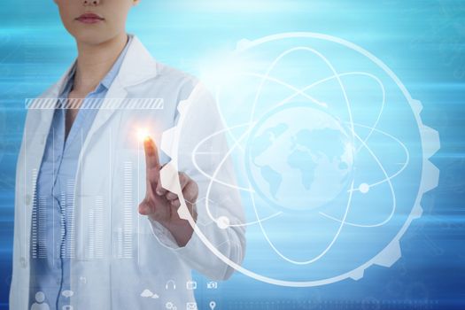 Female doctor using digital screen against blue abstract image