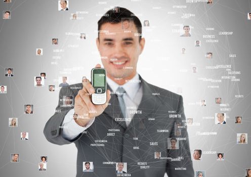 Digital composite of Man holding phone with Profile portraits of people contacts