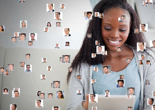 Digital composite of Woman holding tablet with Profile portraits of people contacts