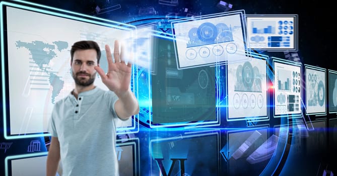 Digital composite of Businessman touching and interacting with technology interface panels