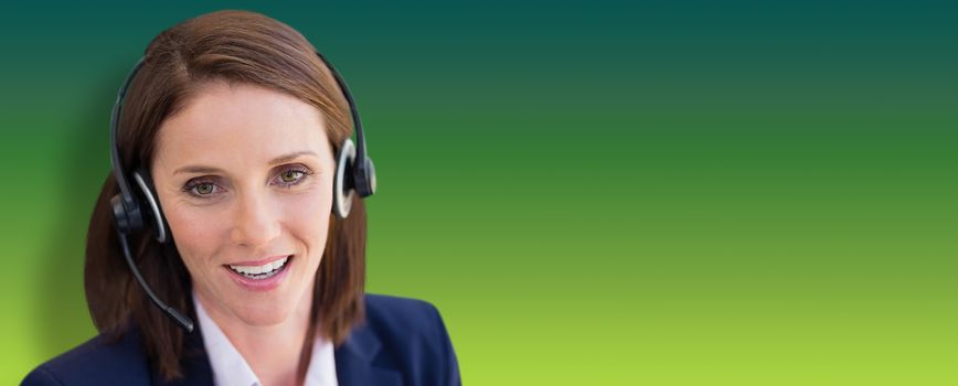 Close-up of smiling woman talking on microphone headset against green abstract background