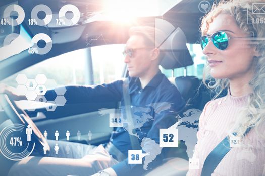 Abstract technology interface against couple doing test drive in car