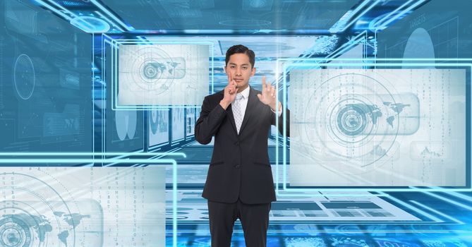 Digital composite of Businessman touching and interacting with technology interface panels