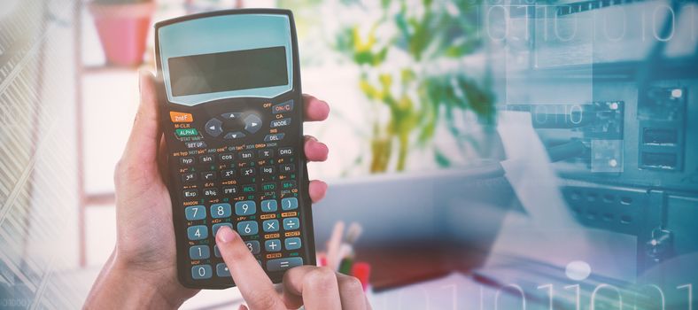 Hands of businesswoman using calculator against composite image of blue technology design with binary code