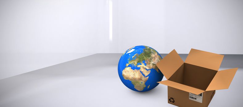 High angle view of planet earth and cardboard box against abstract room