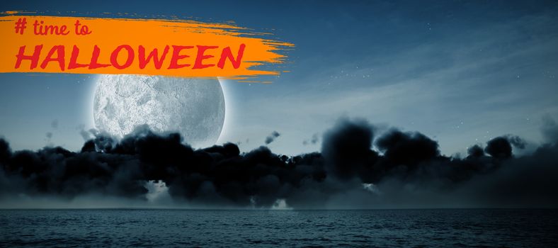 Graphic image of time to Halloween text against view of sea at night