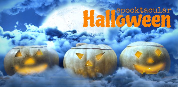 Graphic image of spooktacular Halloween text against shining moon hide by dark grey clouds in the sky 