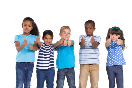 Cute children showing thumbs up at camera on white background