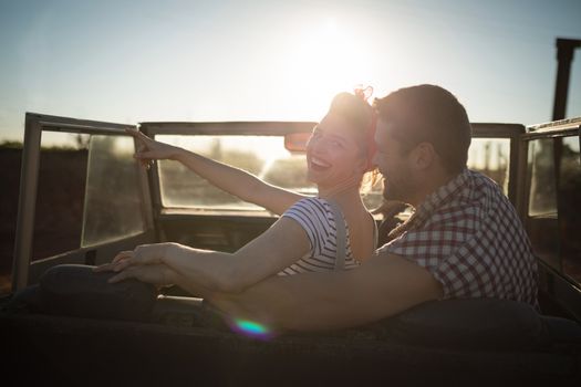 Romantic couple sitting together in a car