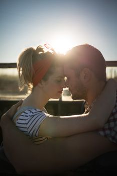 Romantic couple sitting together in a car