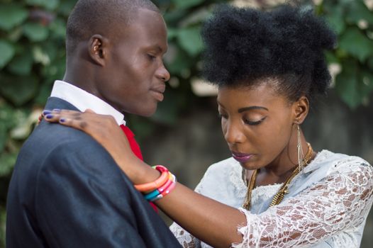 Young couple in love, entwined standing outside